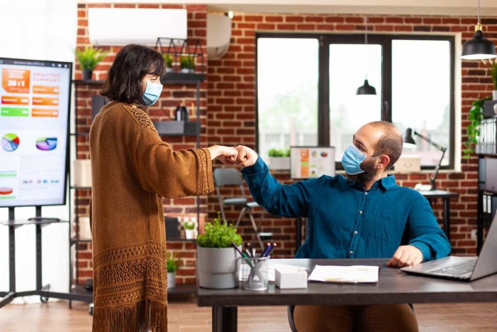 Small business owners using digital platforms to increase online visibility and customer engagement.